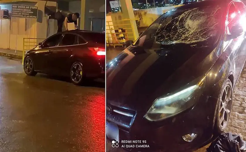 homem levado capô carro 2
