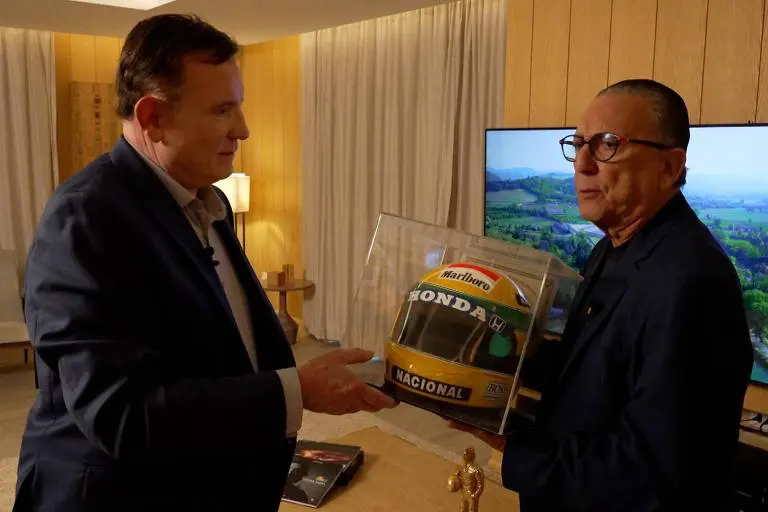 Foto de Roberto Cabrini entrevistando Galvão Bueno