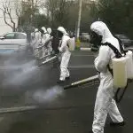 Ruas sendo desinfetadas em Teerã, a capital do Irã