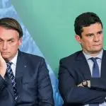 interferência de bolsonaro na pf | O presidente Jair Bolsonaro (à esq.) e o então ministro da Justiça, Sergio Moro, durante evento no Palácio do Planalto | Foto: Arquivo/Agência Brasil
