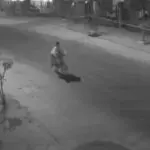 Mulher andando de bicicleta antes de sofrer mal súbito
