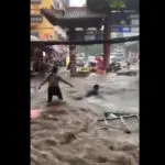 Moradores arrastados tufão china