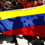 Guiana | Apoiadores de Maduro participam de evento de encerramento de uma campanha sobre o referendo que envolve a anexação da Guiana - 1º/12/2023 | Leonardo Fernández Viloria/Reuters