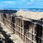 Barreira Mongaguá avanço mar