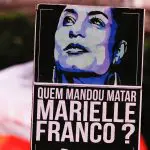 Cartaz com a imagem de Marielle Franco, exibido durante ato público organizado por sindicatos e partidos de esquerda contra a reforma da Previdência, no Rio de Janeiro (22/3/2019) | Foto: André MA/Shutterstock