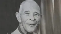 Padre Libério Rodrigues Moreira, foto em preto e branco, com um sorriso bondoso