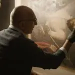 Homem restaurando a obra Ecce Homo na Espanha