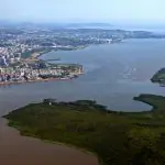 O rio Guaíba banha algumas cidades da região metropolitana de Porto Alegre | Foto: Reprodução/Redes sociais