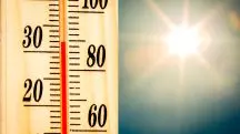 No Brasil, inverno começa com calor; na imagem, termômetro com temperatura elevada, com raios de sol ao fundo