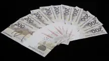 Cédulas de 200 reais, em fundo preto Cédulas de 200 reais, em fundo preto, para ilustrar desvalorização do real, em relação ao dólar dos EUA