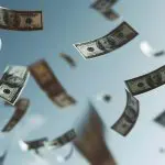 Cédulas de dólar caindo