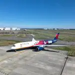 Avião da Delta com adesivo olímpico