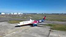Avião da Delta com adesivo olímpico