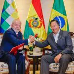 Lula e Luis Arce sentados