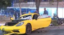 Porsche Cayman amarela batida