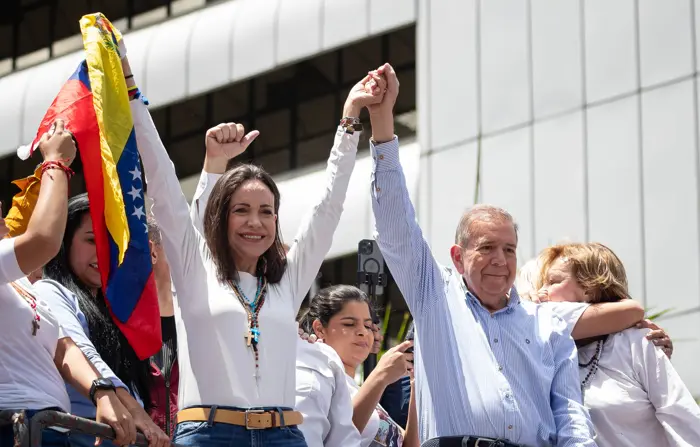 A líder da oposição venezuelana, María Corina Machado, e o candidato Edmundo González durante um comício em 30 de julho de 2024 | Foto: Reprodução/Twitter/X