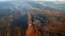 Vista aérea da zona sul da cidade de Ribeirão Preto, na manhã deste domingo (25), mostra o resultado dos incêndios florestais que atingem o Estado de Estado de São Paulo | Foto: Thiago Calil/AGIF - Agência de Fotografia/ Estadão Conteúdo; Sobe para 4 o número de presos por causar incêndios no Estado de São Paulo