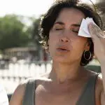 Mulher durante onda de calor