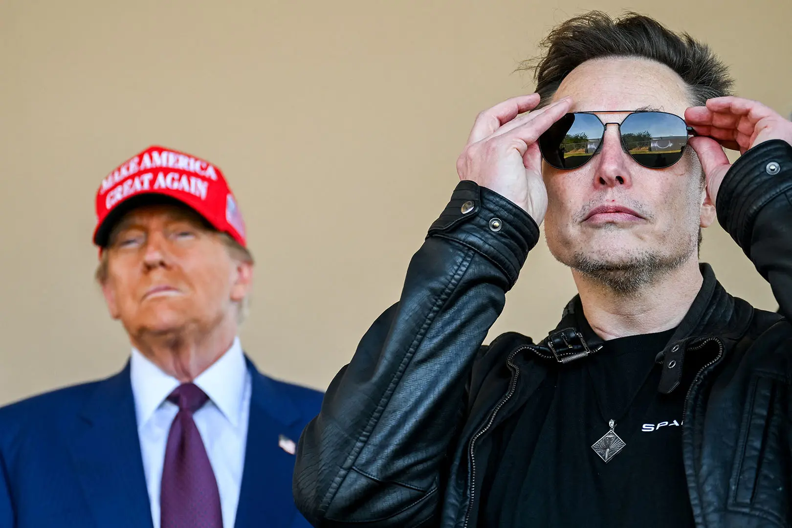 Donald Trump e Elon Musk são entusiastas do bitcoin | Foto: Brandon Bell/Pool via Reuters