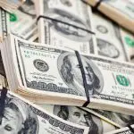 Maços de dólar, a moeda dos Estados Unidos
