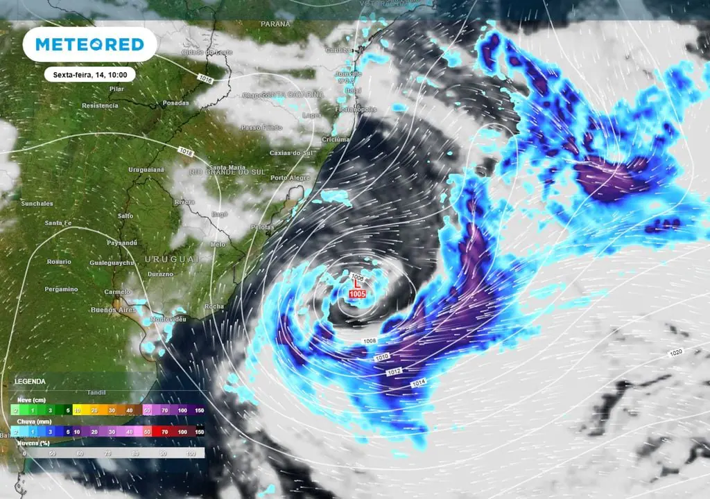 Previsão de pressão, ventos, nebulosidade e chuva na sexta-feira durante a manhã mostra o ciclone extratropical se configurando sobre o oceano atlântico sul, na altura do RS e do Uruguai
