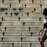 Ato em frente à Câmara Municipal do Rio de Janeiro, contra o feminicídio, em 2023; violência contra a mulher