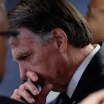 Ex-presidente Jair Bolsonaro, durante julgamento no STF por suposta 'tentativa de golpe', em Brasília | Foto: Reuters/Diego Herculano