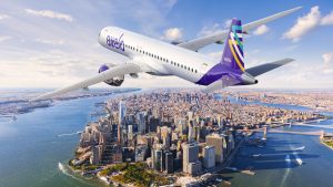 Avião da Avelo em sobrevoo à ilha de Manhatan, em Nova York: primeira companhia dos EUA a operar um E195-E2 | Foto: Divulgação/Avelo Airlines