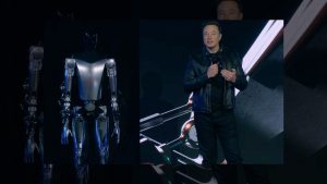 O robô Optimus e seu idealizador, Elon Musk; pelo histórico, é bom não duvidar das previsões do bilionário | Foto: Divulgação/Tesla