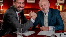À esquerda, Guilherme Boulos; à direita, Luiz Inácio Lula da Silva