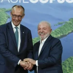 Lula da Silva (d) e o chanceler da Alemanha, Friedrich Merz | Foto: Tânia Rêgo/Agência Brasil