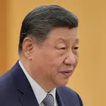 Xi Jinping durante uma reunião com o primeiro-ministro britânico Keir Starmer, no Grande Salão do Povo em Pequim - 29/1/2026 | Foto: Vincent Thian/Reuters