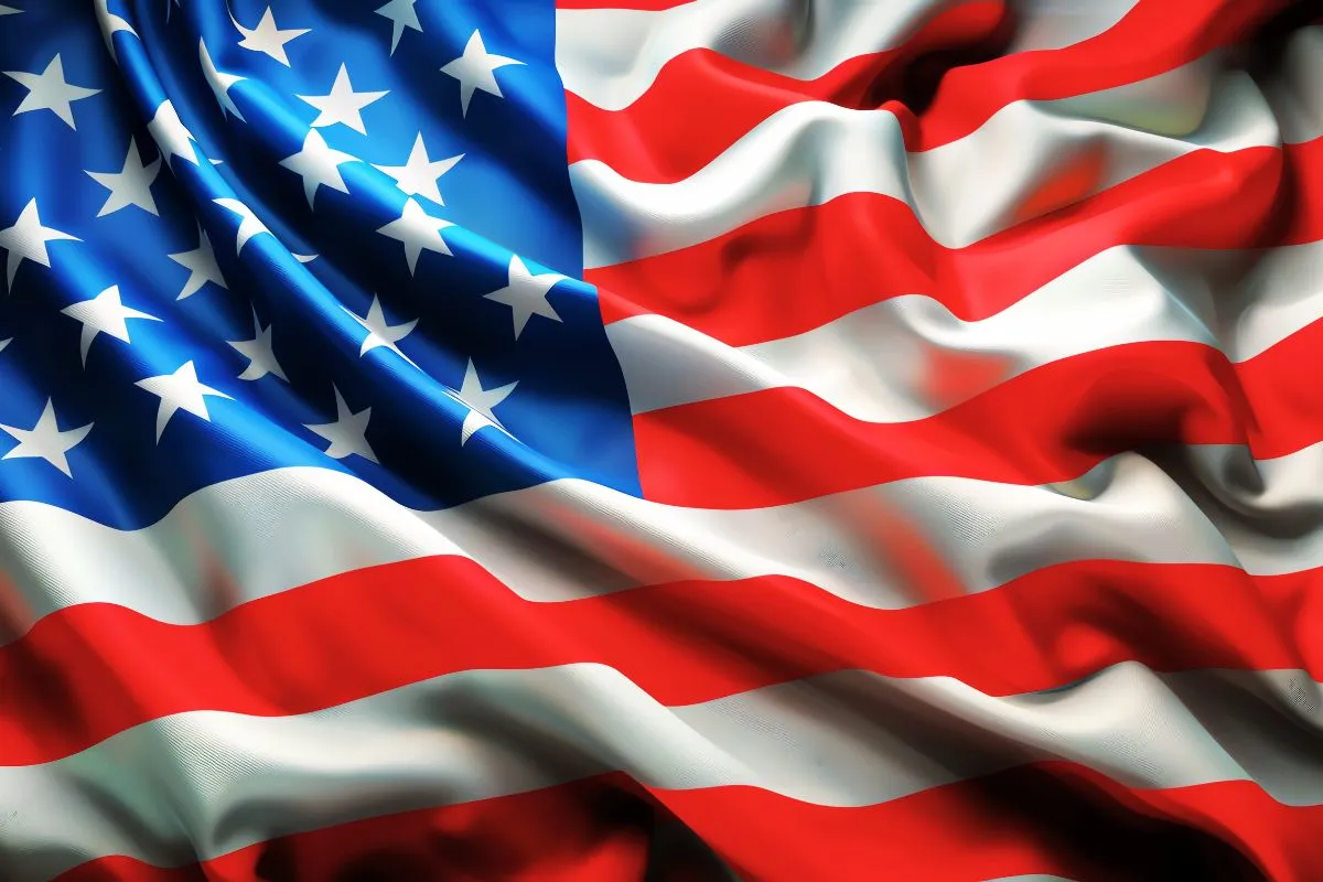 Bandeira dos Estados Unidos com estrelas brancas e listras vermelhas e brancas em movimento