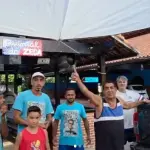 zeca-pagoinho-distribui-ovos-de-pascoa-xerem-rio-de-janeiro