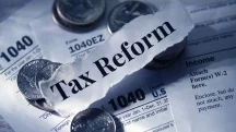 Documento com a expressão tax reform sobre formulários fiscais e moedas relacionado à reforma tributária de 2026