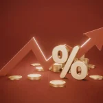 Símbolo de porcentagem com seta de alta e moedas representando juros, inflação e indicadores econômicos em 2026.